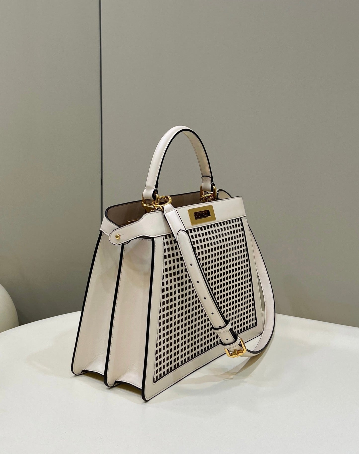 PEEKABOO ISEEU 34 IN WHITE PERFORATED CALFSKIN GOLD HARDWARE mysite