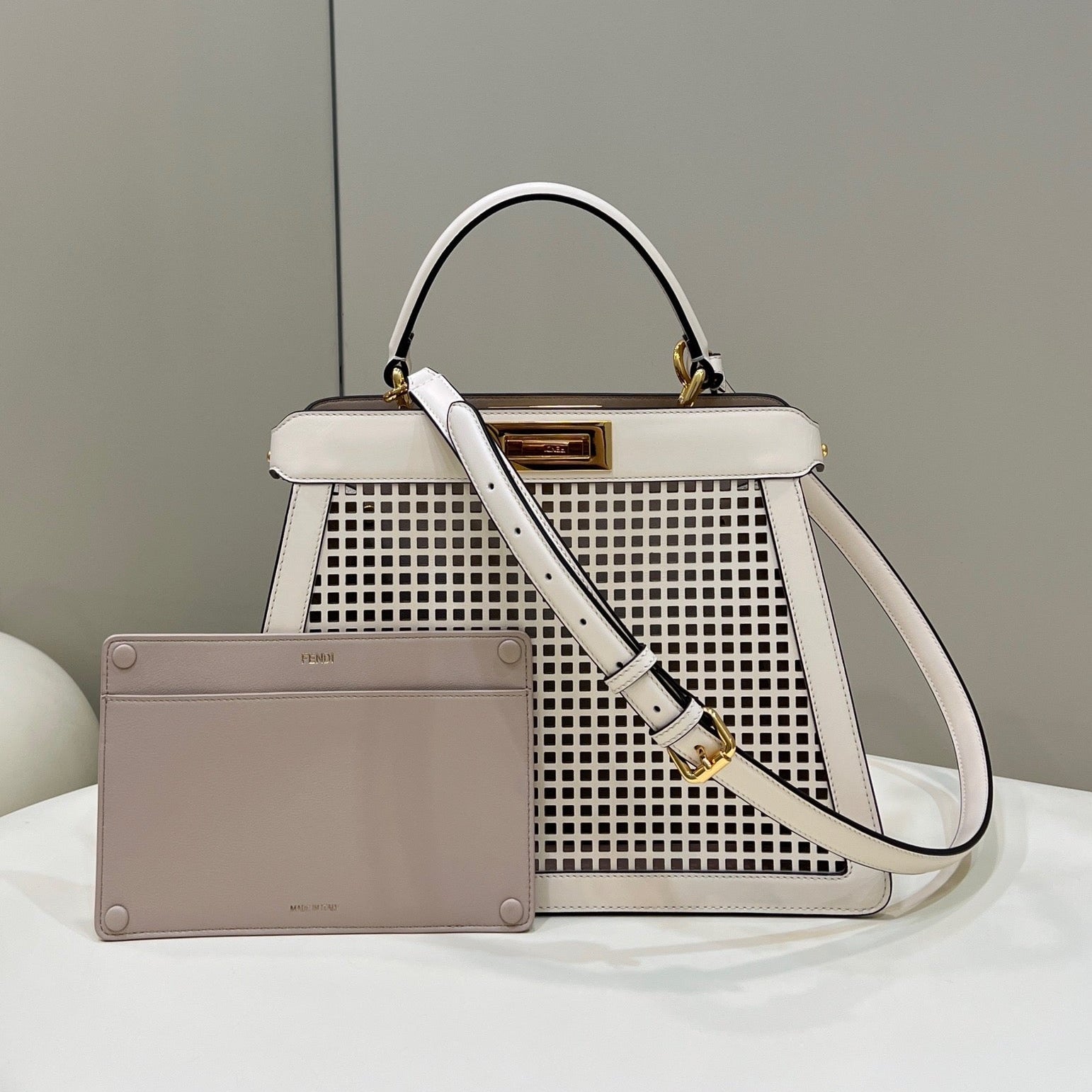 PEEKABOO ISEEU 34 IN WHITE PERFORATED CALFSKIN GOLD HARDWARE mysite