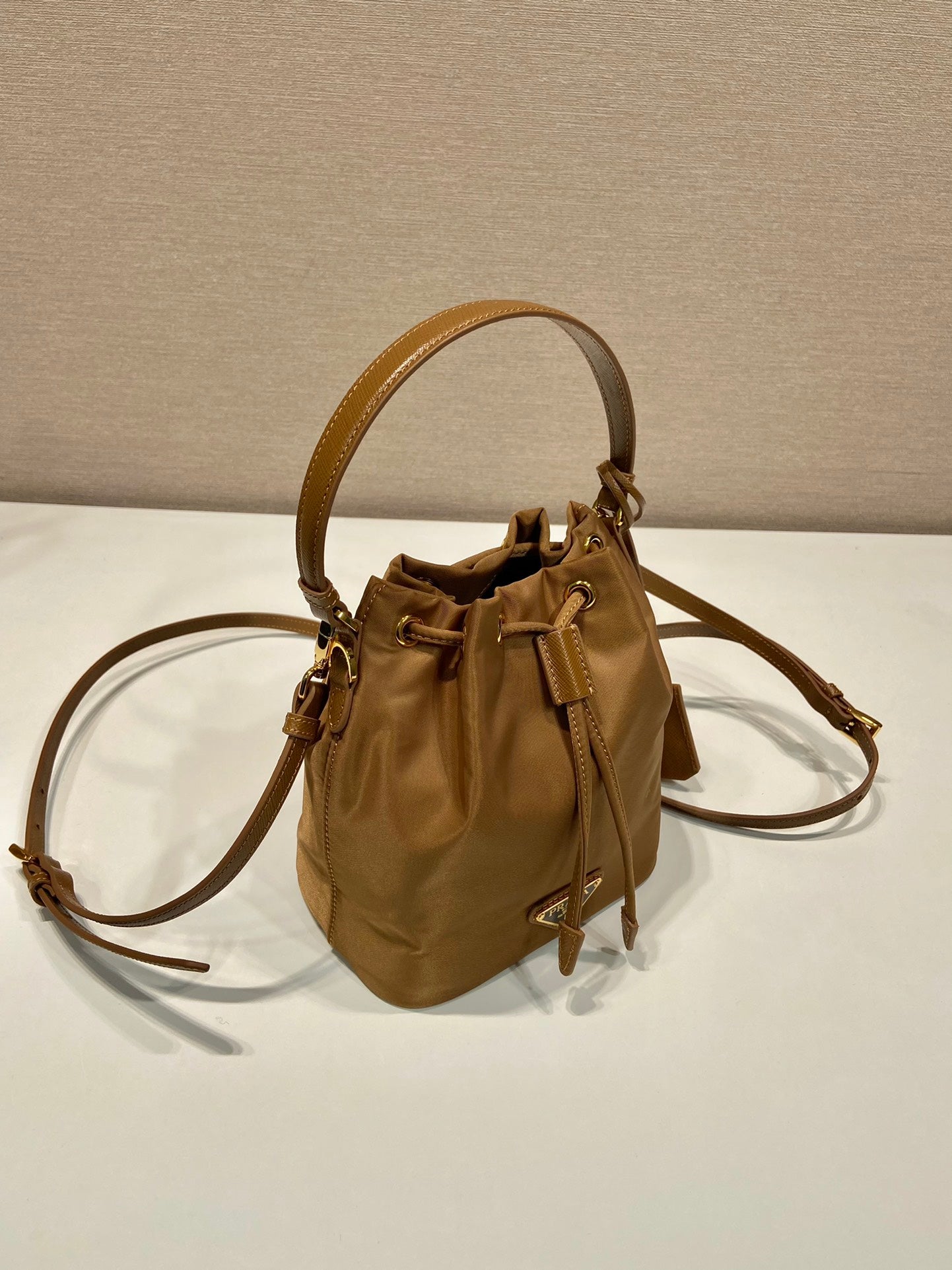 BUCKET BAG 19 IN RUSSET BROWN RE-NYLON AND CALFSKIN HANDLE mysite