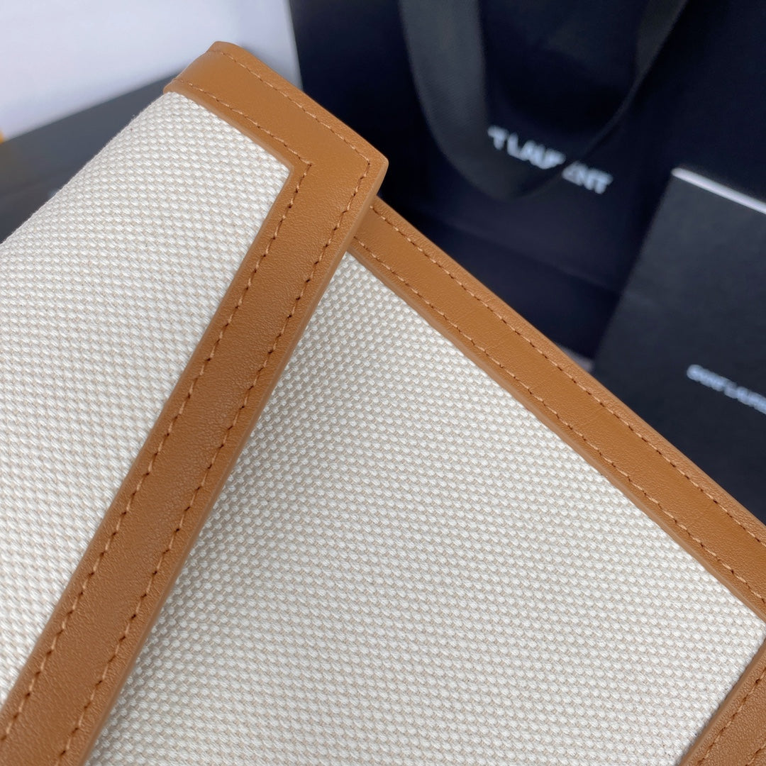 UPTOWN POUCH 27 IN WHITE CANVAS AND BROWN LEATHER TRIM GOLD LOGO mysite