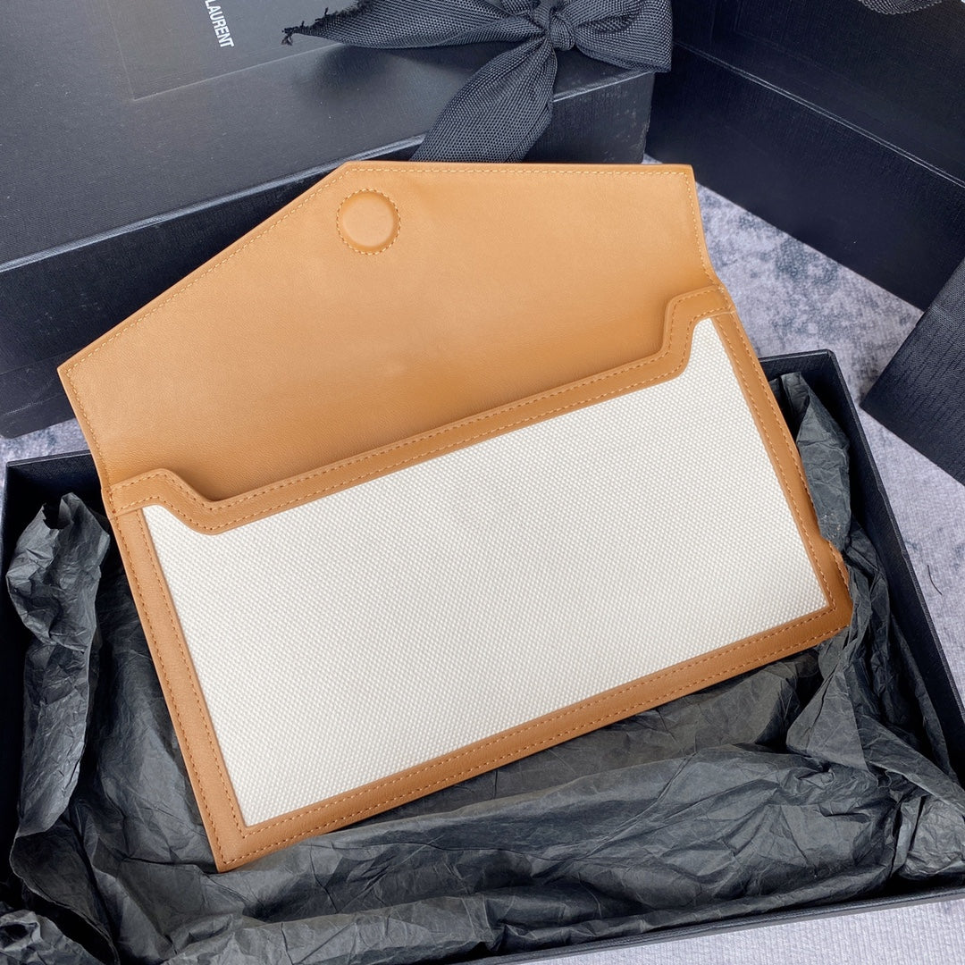 UPTOWN POUCH 27 IN WHITE CANVAS AND BROWN LEATHER TRIM GOLD LOGO mysite