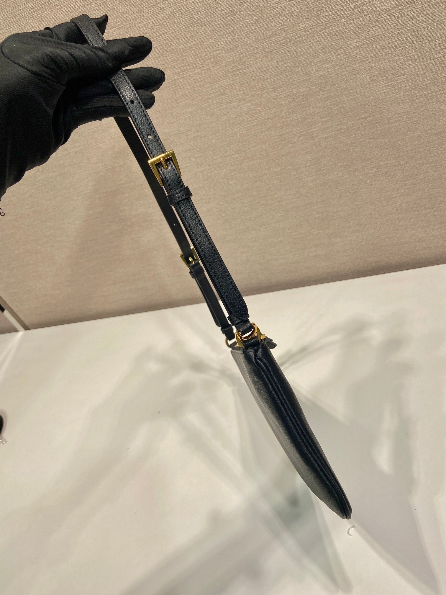 TRIANGLE LOGO SHOULDER BAG 24 IN BLACK SMOOTH CALFSKIN mysite