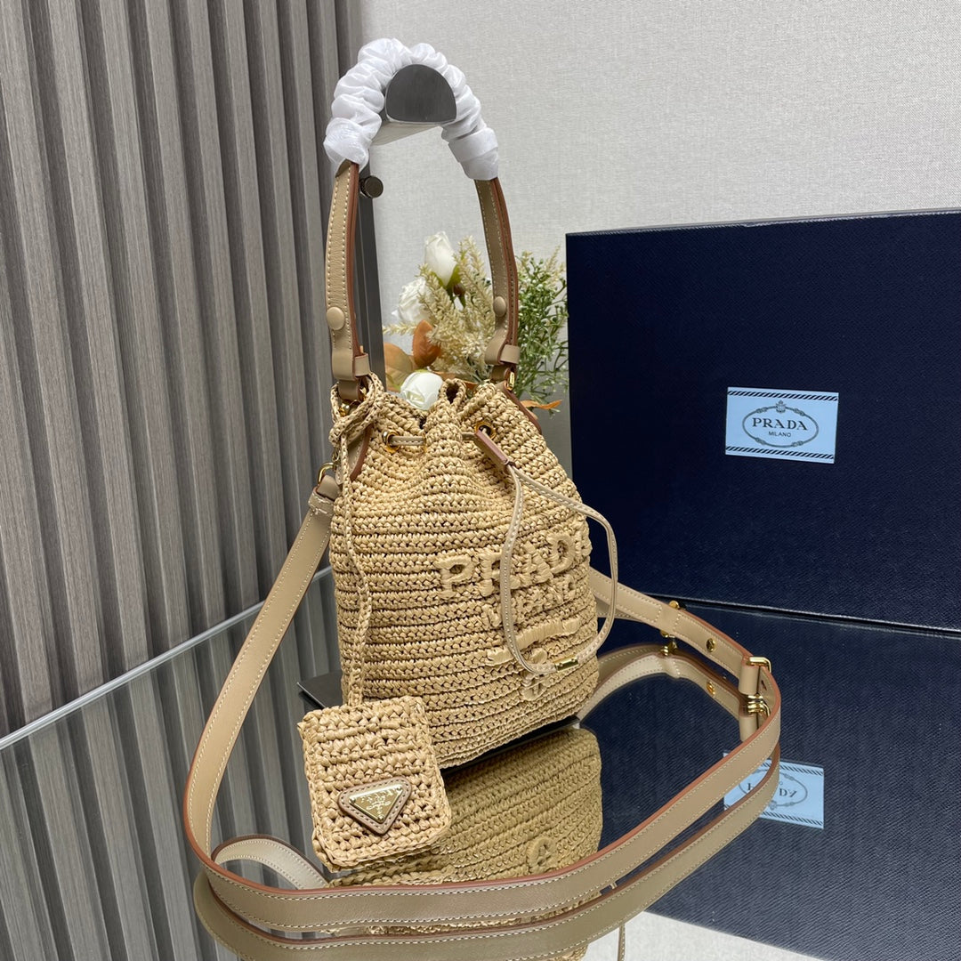 BUCKET BAG 20 IN BEIGE WOVEN RAFFIA EMBOSSED LOGO mysite