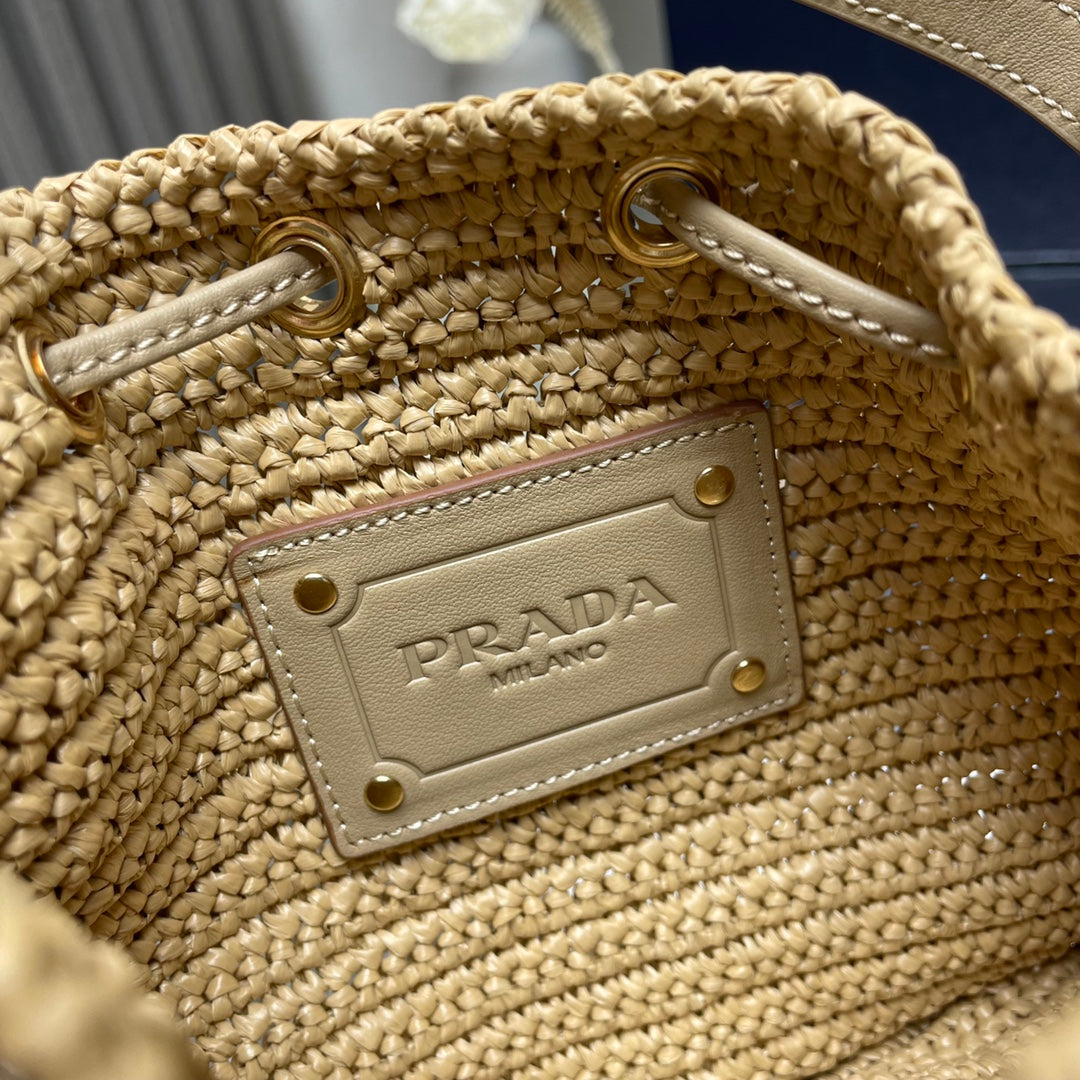 BUCKET BAG 20 IN BEIGE WOVEN RAFFIA EMBOSSED LOGO mysite