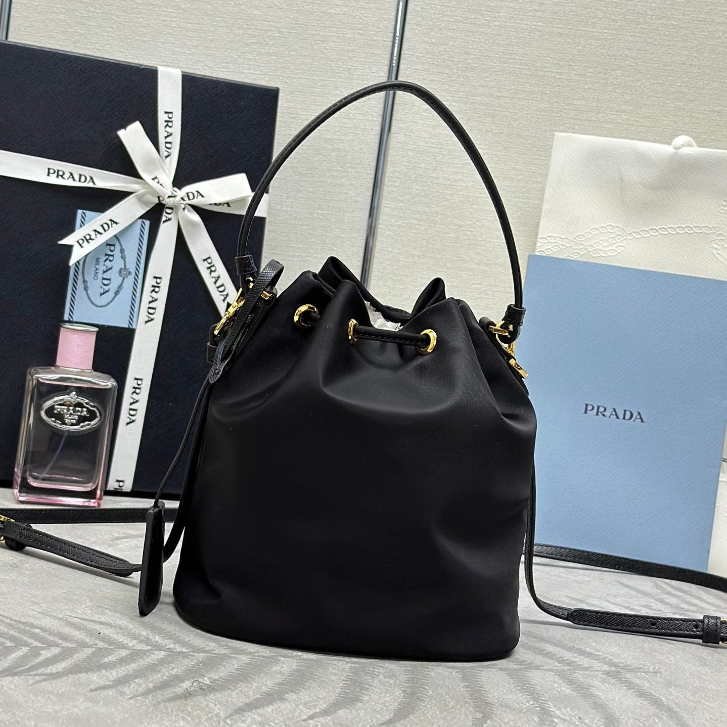 BUCKET BAG 19 IN BLACK RE-NYLON AND CALFSKIN HANDLE mysite