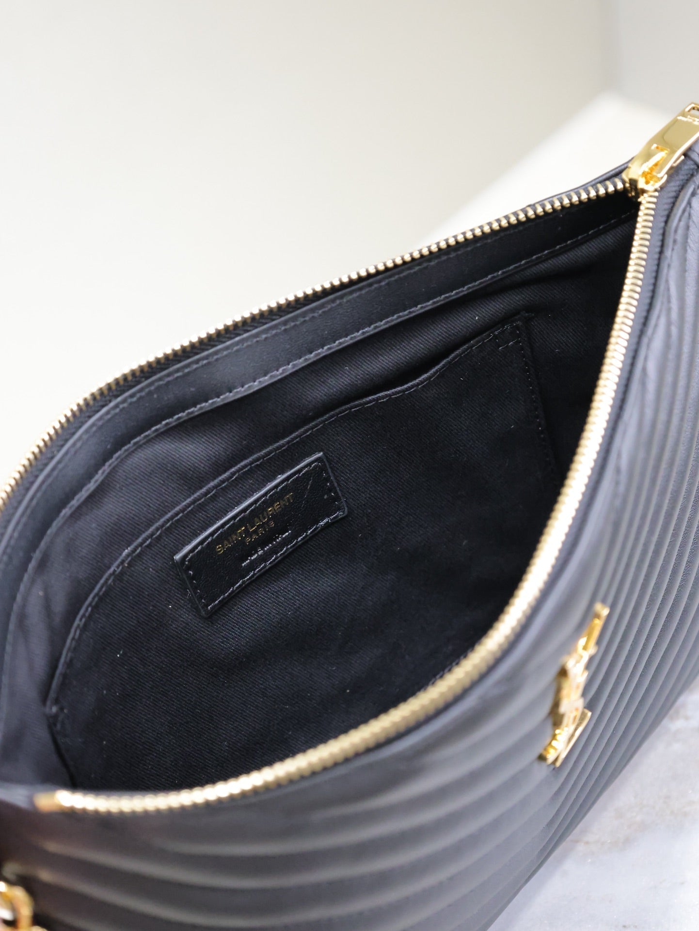 CLUTCH 30 IN BLACK QUILTED CALFSKIN GOLD BUCKLE mysite